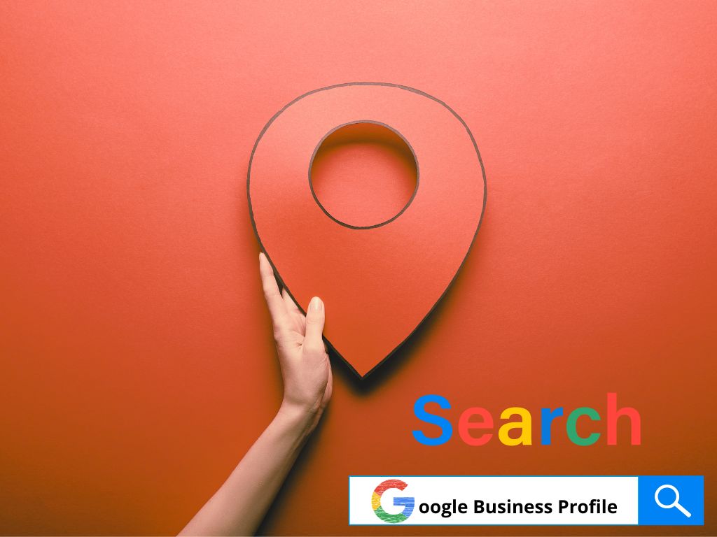 mano che mostra il segnalino rosso di ricerca di Google maps e sotto con una barra di ricerca di Google con su scritto Google Business Profile